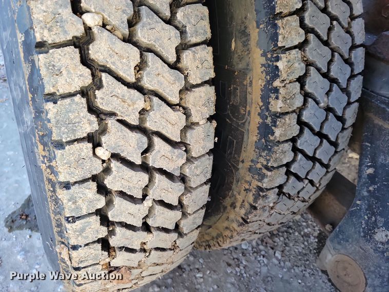 image for item DX6603 1986 White Xpeditor WX roll-off container truck