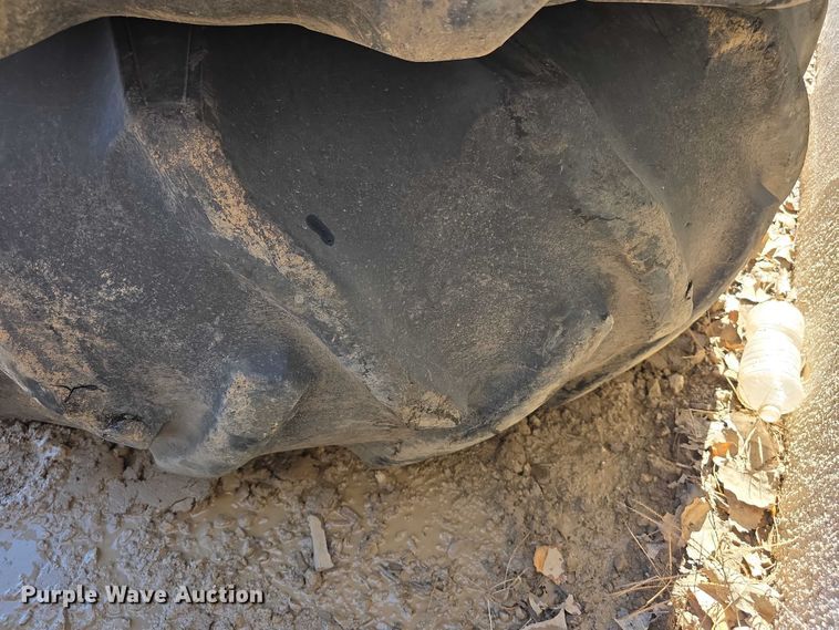 image for item DZ3504 (2) Goodyear 23.1-34 tires and wheels