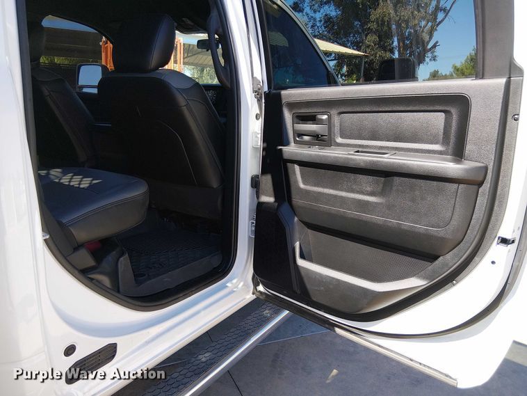 image for item EC1249 2023 RAM 4500HD Crew Cab flatbed truck