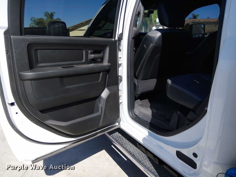 image for item EC1249 2023 RAM 4500HD Crew Cab flatbed truck