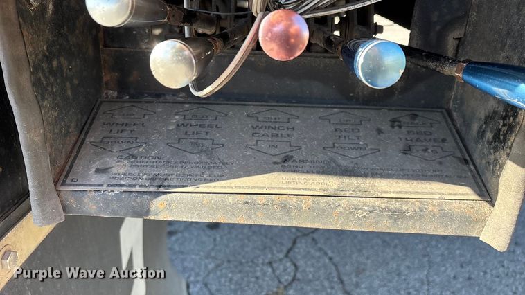 image for item ED2335 2015 Peterbilt 337 rollback truck