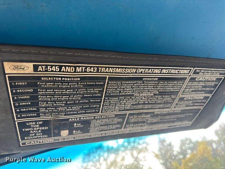 image for item EN0703 1985 Ford F800 rollback truck