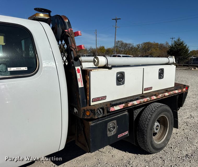 image for item ER0236 2011 Chevrolet Silverado 3500HD Ext. Cab flatbed pickup truck