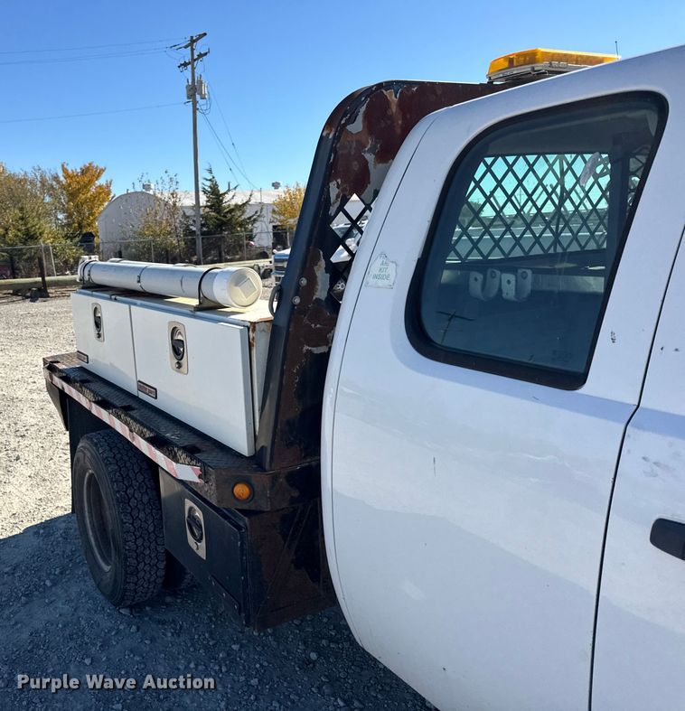 image for item ER0236 2011 Chevrolet Silverado 3500HD Ext. Cab flatbed pickup truck