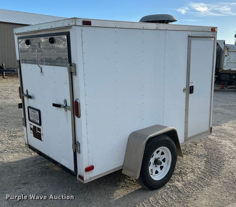 image for item DF8662 2012 Arising Industries Inc. 58SSRW enclosed cargo trailer with Mecc Alte generator