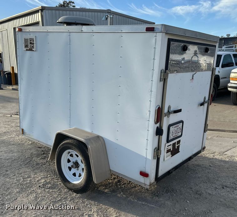 image for item DF8662 2012 Arising Industries Inc. 58SSRW enclosed cargo trailer with Mecc Alte generator
