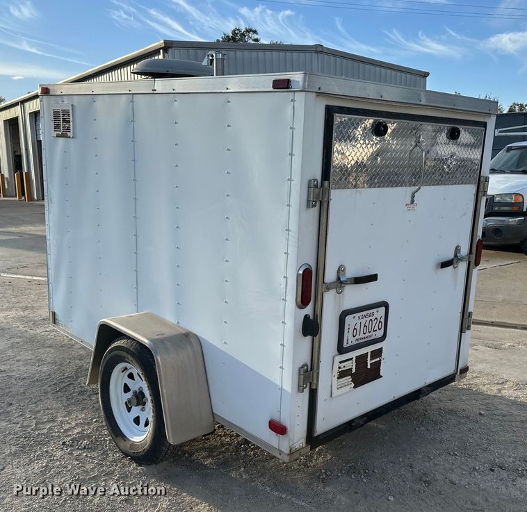 image for item DF8662 2012 Arising Industries Inc. 58SSRW enclosed cargo trailer with Mecc Alte generator