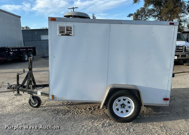 image for item DF8662 2012 Arising Industries Inc. 58SSRW enclosed cargo trailer with Mecc Alte generator