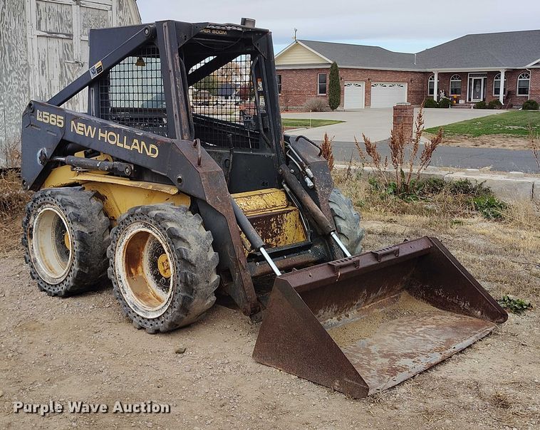 MINI CARGADOR SOBRE RUEDAS 1999 NEW HOLLAND LX565