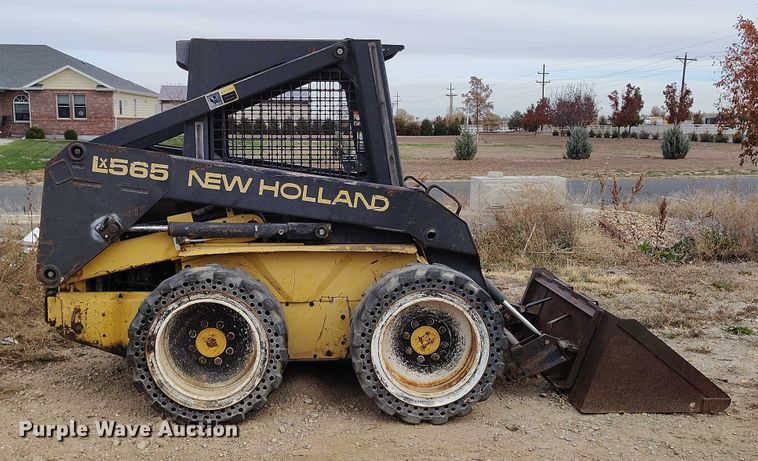 MINI CARGADOR SOBRE RUEDAS 1999 NEW HOLLAND LX565