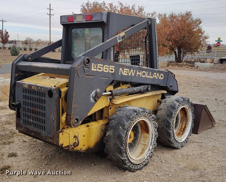 MINI CARGADOR SOBRE RUEDAS 1999 NEW HOLLAND LX565