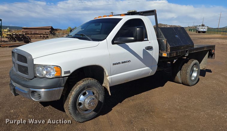 image for item DY1408 2004 Dodge Ram 3500 flatbed pickup truck