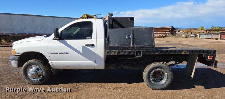 image for item DY1408 2004 Dodge Ram 3500 flatbed pickup truck