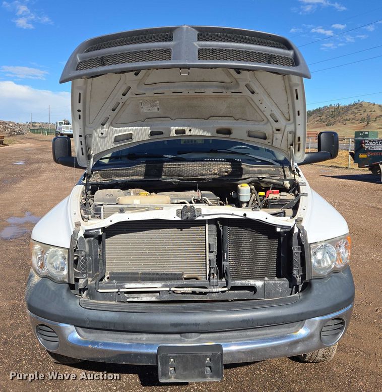 image for item DY1408 2004 Dodge Ram 3500 flatbed pickup truck