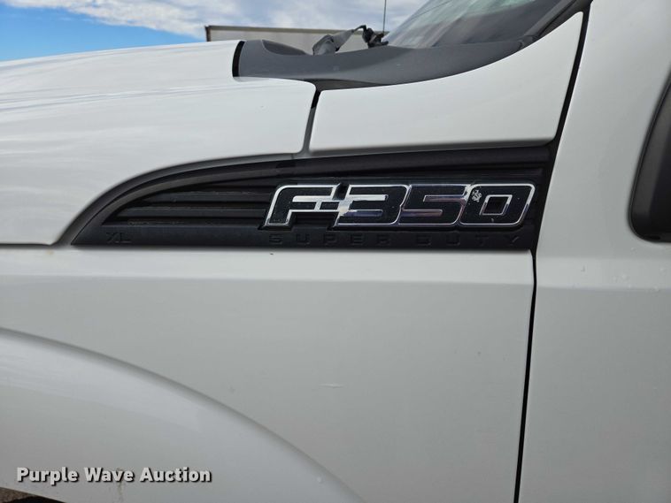 image for item DY1409 2012 Ford F350 Super Duty XL utility bed pickup truck