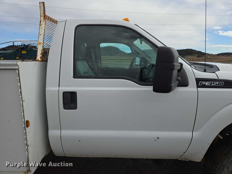 image for item DY1409 2012 Ford F350 Super Duty XL utility bed pickup truck