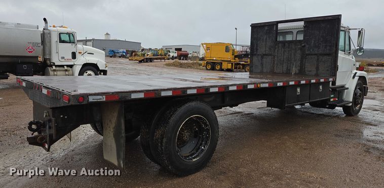 image for item DY1412 1992 Freightliner FL70 flatbed pickup truck