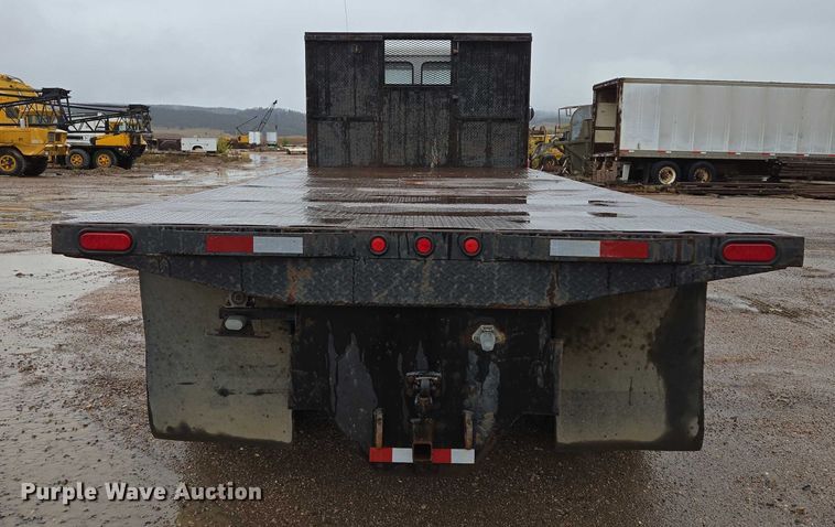 image for item DY1412 1992 Freightliner FL70 flatbed pickup truck