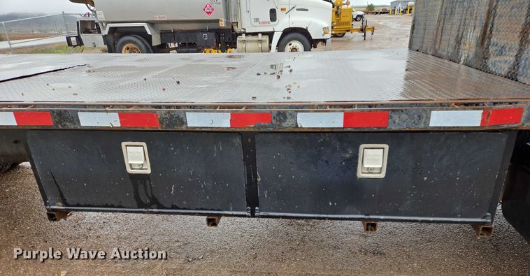 image for item DY1412 1992 Freightliner FL70 flatbed pickup truck