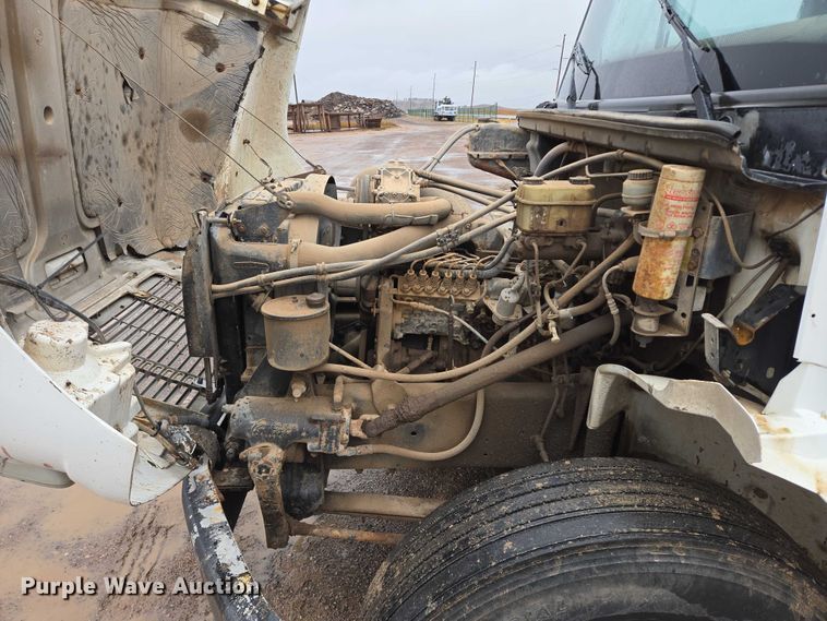 image for item DY1412 1992 Freightliner FL70 flatbed pickup truck