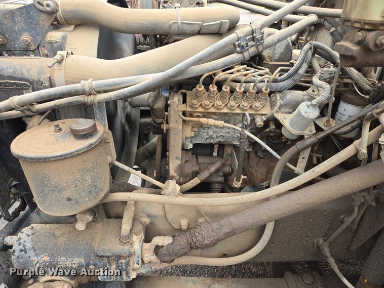 image for item DY1412 1992 Freightliner FL70 flatbed pickup truck