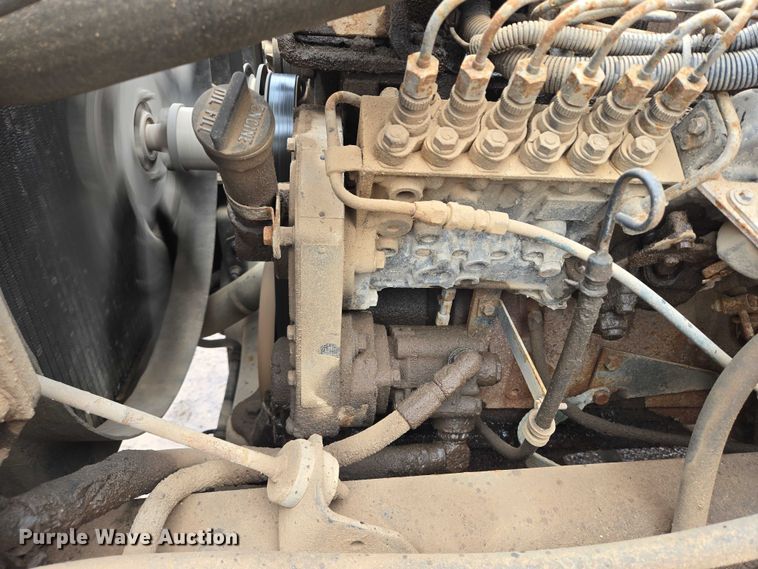 image for item DY1412 1992 Freightliner FL70 flatbed pickup truck