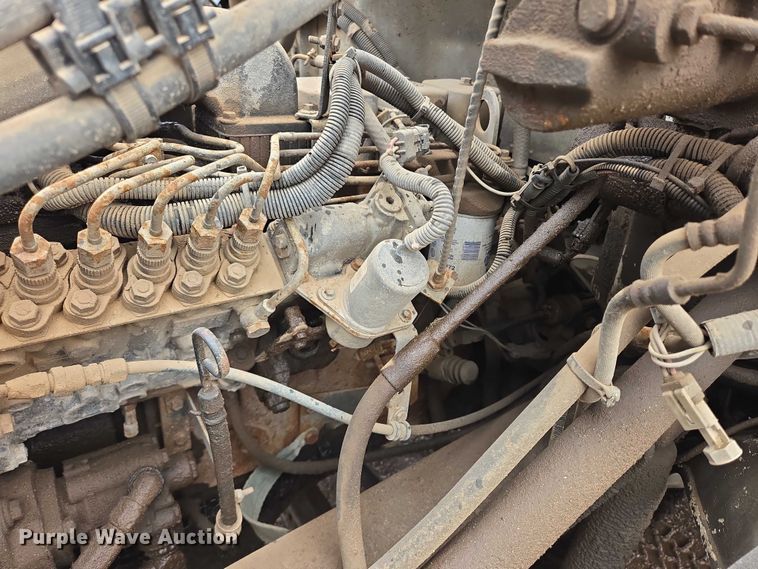 image for item DY1412 1992 Freightliner FL70 flatbed pickup truck