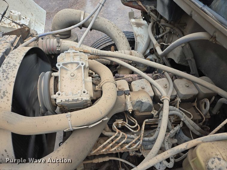 image for item DY1412 1992 Freightliner FL70 flatbed pickup truck