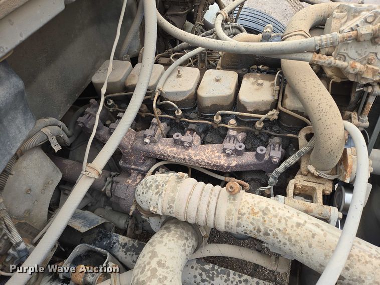 image for item DY1412 1992 Freightliner FL70 flatbed pickup truck