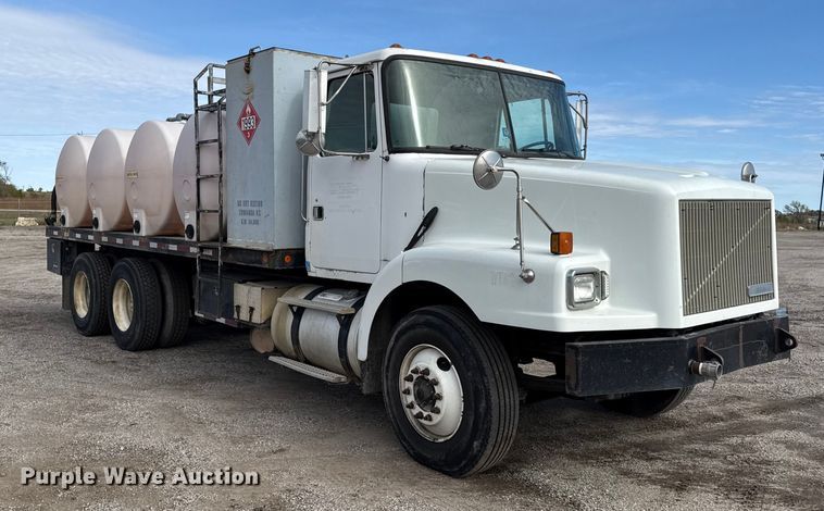 image for item DY8379 1994 Volvo WB flatbed truck