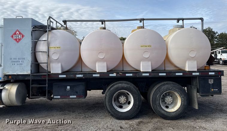 image for item DY8379 1994 Volvo WB flatbed truck