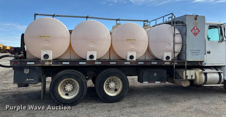 image for item DY8379 1994 Volvo WB flatbed truck