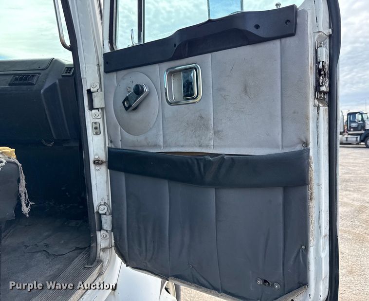 image for item DY8379 1994 Volvo WB flatbed truck