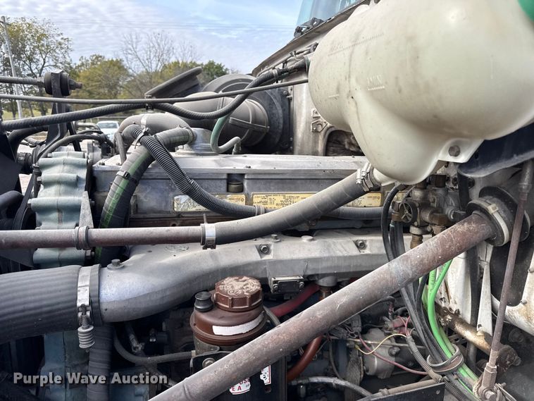 image for item DY8379 1994 Volvo WB flatbed truck