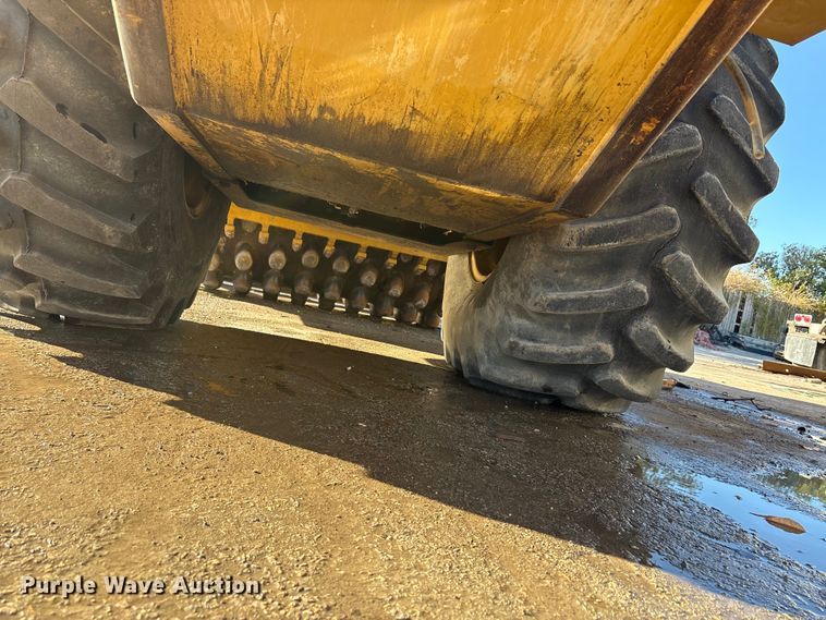 image for item EA7734 2003 Caterpillar CP-563E single drum vibratory roller