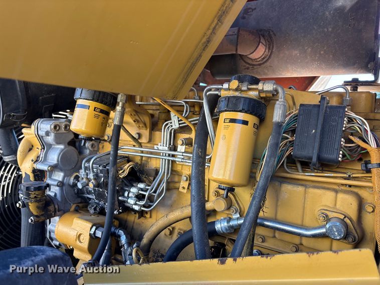 image for item EA7734 2003 Caterpillar CP-563E single drum vibratory roller