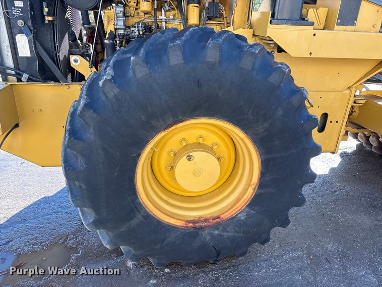 image for item EA7734 2003 Caterpillar CP-563E single drum vibratory roller