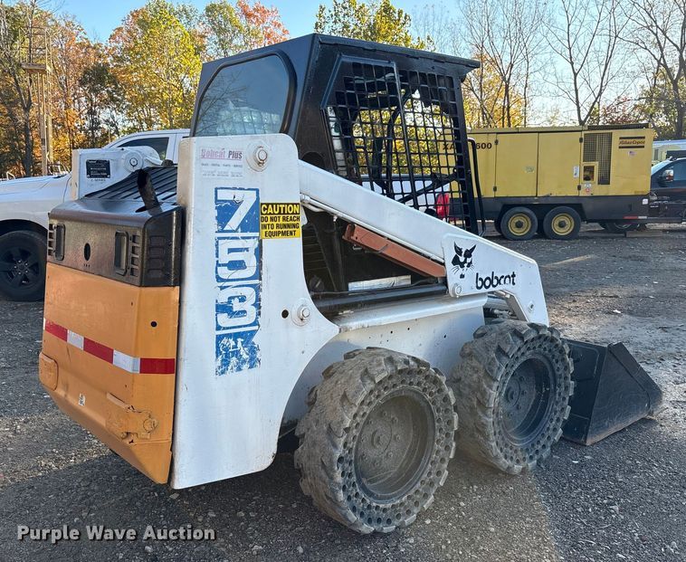MINI CARGADOR SOBRE RUEDAS 1997 BOBCAT 753