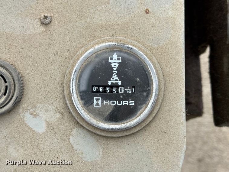 image for item EN0635 1999 SkyJack SJIII-3015 scissor lift