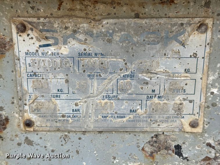 image for item EN0635 1999 SkyJack SJIII-3015 scissor lift