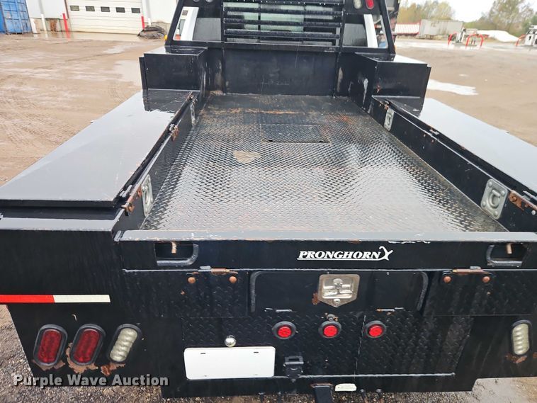 image for item EO4745 2018 RAM 3500 Crew Cab flatbed pickup truck