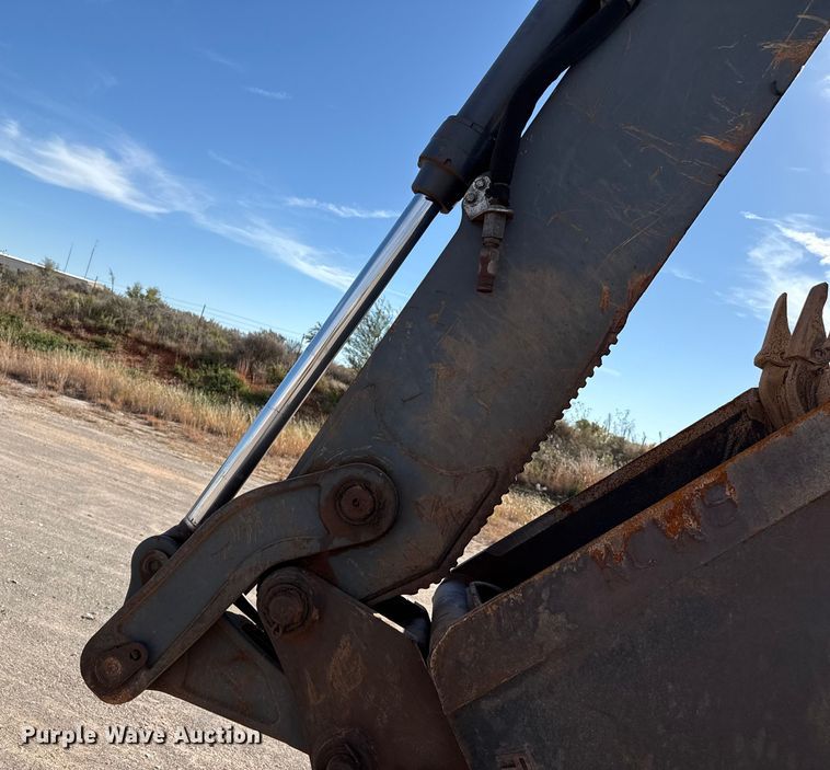 image for item EP0900 2009 John Deere 710J backhoe