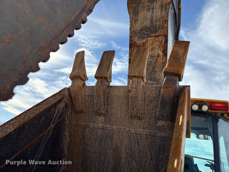 image for item EP0900 2009 John Deere 710J backhoe