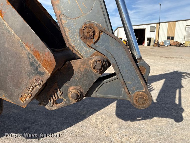 image for item EP0900 2009 John Deere 710J backhoe