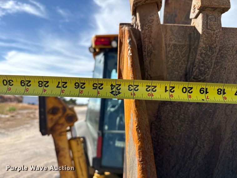 image for item EP0900 2009 John Deere 710J backhoe