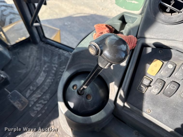 image for item EP0900 2009 John Deere 710J backhoe