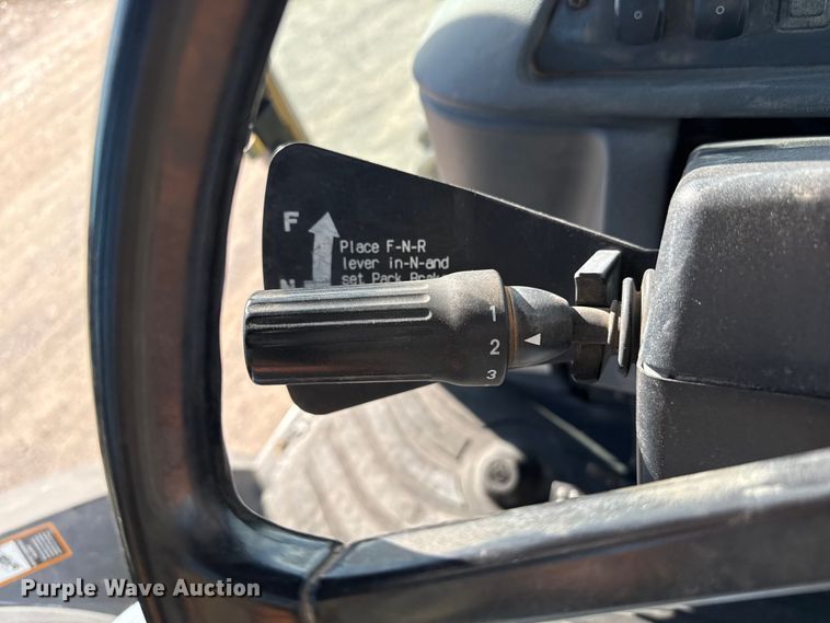 image for item EP0900 2009 John Deere 710J backhoe