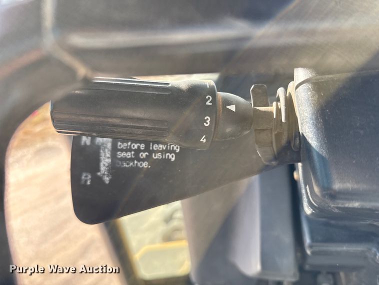 image for item EP0900 2009 John Deere 710J backhoe