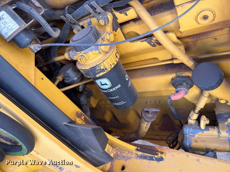 image for item EP0900 2009 John Deere 710J backhoe