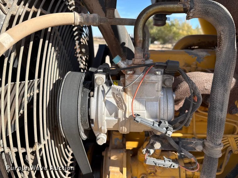 image for item EP0900 2009 John Deere 710J backhoe